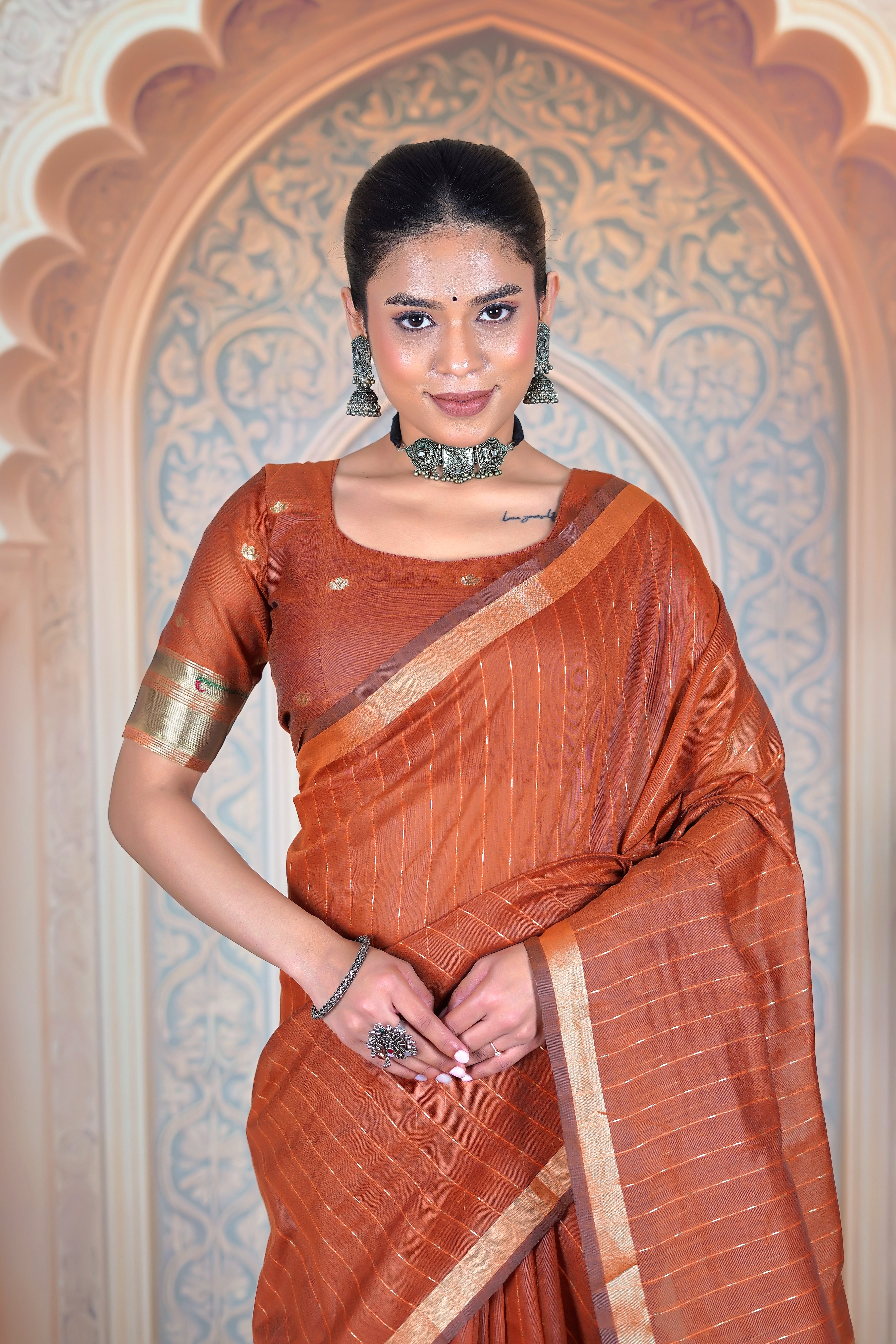 Golden Threads on Rust – A Kahani of Quiet Elegance