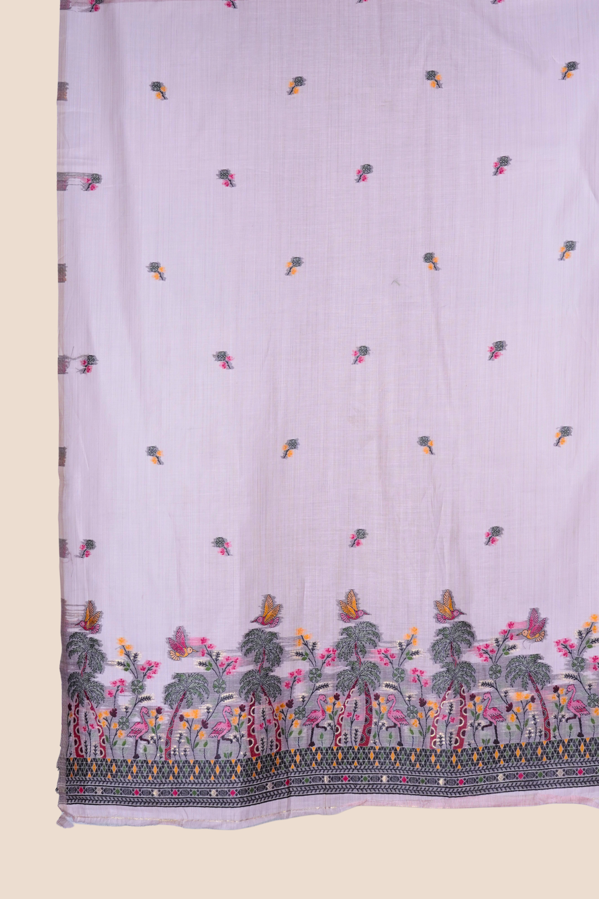 Blush pink muga cotton unstitched dress material with floral and bird-inspired scenic border